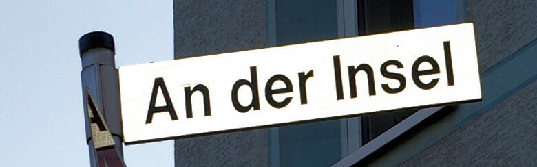 Straßenschild An der Insel